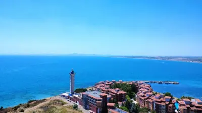 an aerial view of a city and the ocean at Ваканционен Апартамент in Aheloy