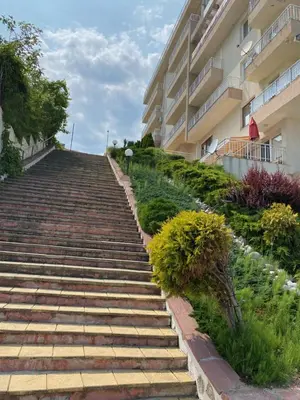 a set of stairs leading to a building at Зора-Обзор in Obzor