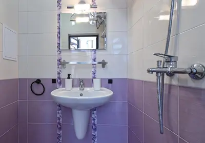 a bathroom with a sink and a mirror at Via Sunride 2 - Maisonette Apartment by the sea in Sozopol