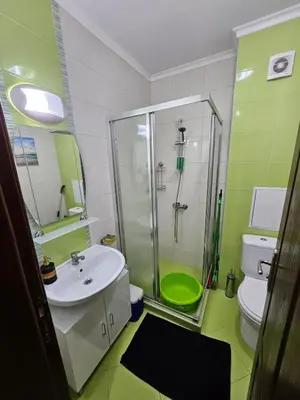 a bathroom with a shower and a sink and a toilet at Romantic Sensual Retreat Studio by Flat Mаnager in Ravda