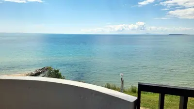 a view of the ocean from a balcony at Под наем 4-стаен Апартамент с Изумителна фронтална гледка море, Sun Coast resort Свети Влас in Sveti Vlas