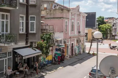 a group of buildings on a city street at City Center Luxury Apartments in Varna City