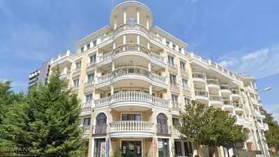 a large white building with balconies on it at Barbie-Themed 3BDR Penthouse Near The Beach, Nessebar in Nesebar