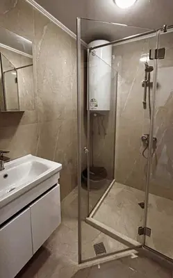 a bathroom with a shower and a sink at The better apartment in Burgas City