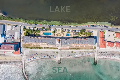 an aerial view of a resort on the beach at Cosher Gardenia Palace Apt 6 Free Parking in Pomorie
