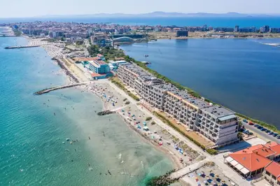 an aerial view of a beach with a resort at Cosher - Gardenia Palace Apt 9 Free Parking in Pomorie