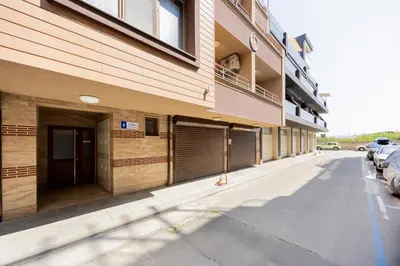 an empty street in front of a building at Marea in Pomorie