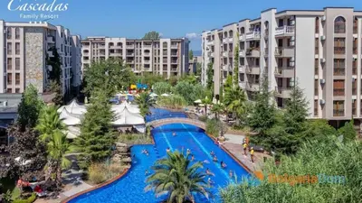an aerial view of a resort with a large swimming pool at Апартамент Каскадас in Sunny Beach