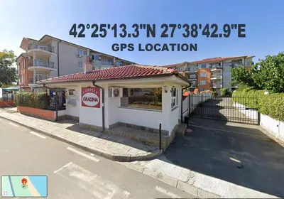a gas station on the side of a street at 