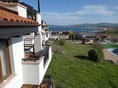a view from the side of a building looking at the water at Апартаменти за гости Морска гледка in Chernomorets