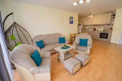 a living room with a couch and chairs and a table at The Sea Balcony - 1BD Apartment by Flat Mаnager in Burgas City