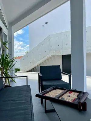 a living room with a couch and a table at Slow Living House in Lozenets