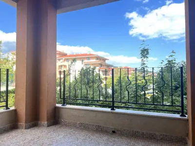 a large window with a view of a building at PREMIER HOUSE BEACH Hotel in Sveti Vlas