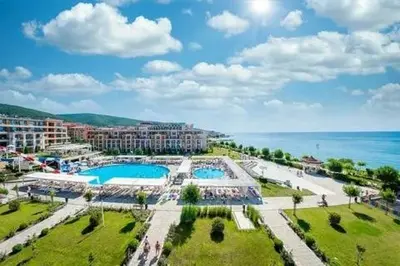 an aerial view of a resort with two swimming pools at PREMIER HOUSE BEACH Hotel in Sveti Vlas