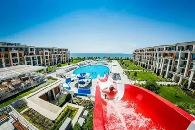 an aerial view of a resort with a swimming pool at PREMIER HOUSE BEACH Hotel in Sveti Vlas