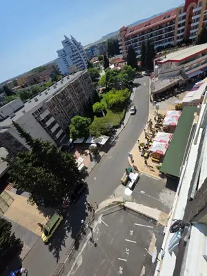 an overhead view of a city street with a parking lot at Apartament Hotel Miramar Palace in Sunny Beach
