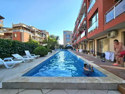 two people in a swimming pool in a building at Z&Z 