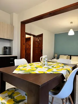 a dining room table with a table cloth on it at Villa Nikoleta in Sveti Vlas