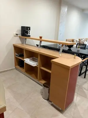 an office cubicle with a desk with a coffee maker at Miramar Palace 615 in Sunny Beach