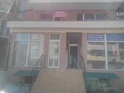 a building with stairs in front of a building at Rumen Apartment in Nesebar