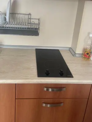 a stove top oven sitting on top of a kitchen counter at BW - Happy 67 in Sunny Beach