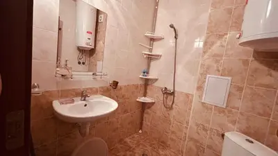 a bathroom with a sink and a shower and a toilet at Sunny Day 6 Studio 11 in Sunny Beach