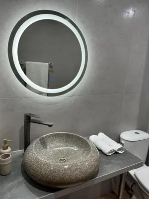 a bathroom with a sink and a mirror at Casa Adora in Sozopol