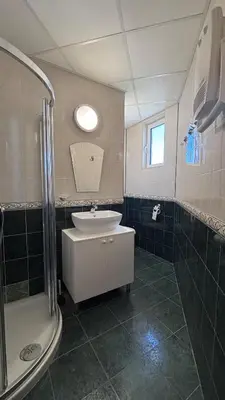 a bathroom with a sink and a shower at Relax in Riviera in Sveti Vlas