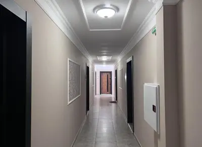 a corridor of a hallway with at Marea Garden Apartment Ravda in Ravda