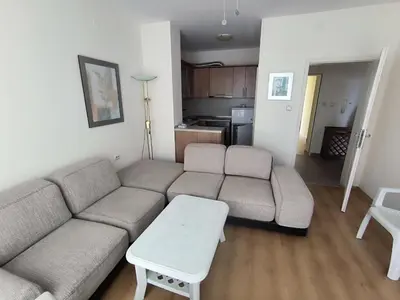 a living room with a couch and a table at PSB Apartment in Flores park in Sunny Beach
