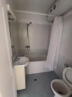 a bathroom with a tub and a toilet and a shower at PSB Apartment in Flores park in Sunny Beach