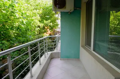 a balcony of a building with a window at NeV Getaway for 2 in Burgas City