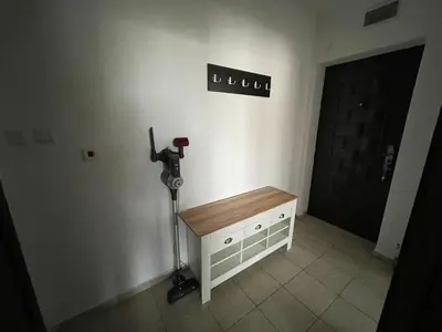 a room with a desk and a camera on the wall at Adagio Sarafovo in Burgas City