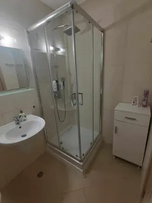 a bathroom with a shower and a sink at Kalia D11 Słoneczny Brzeg Sunny Beach in Sunny Beach
