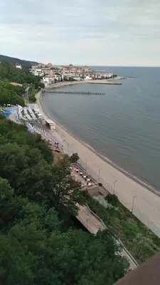a beach with a bunch of cars parked on it at Квартира студия Villa Astoria 2 Болгария Солнечный берег in Elenite