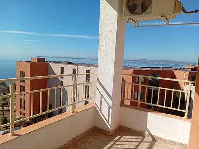 a balcony with a view of the ocean at Imperial Fort Club in Sveti Vlas