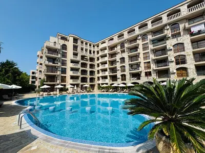 a large apartment building with a large swimming pool at KALIA C2 Two Bedroom Apartment Sunny Beach in Sunny Beach