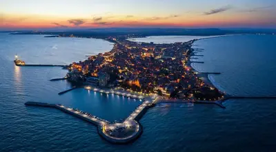 an aerial view of an island in the water at night at Sunny Beach Vila in Sunny Beach