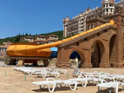 a large inflatable slide in front of a building at ASTORIA II Apartment 54 One Bedroom in Elenite