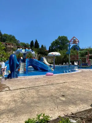 a large water park with a water slide at ASTORIA II Apartment 54 One Bedroom in Elenite