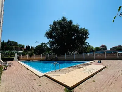a swimming pool with aicrobialicrobialicrobialicrobialicrobial at ASTORIA II Apartment 23 One Bedroom in Elenite