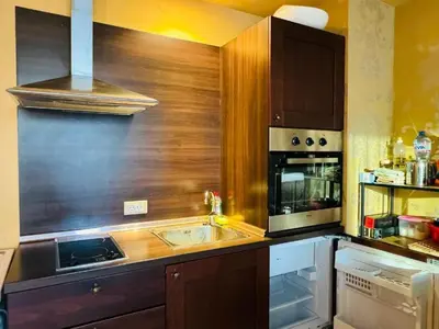 a kitchen with a sink and a stove at Royal Barcelo G404 Sunny Beach in Sunny Beach
