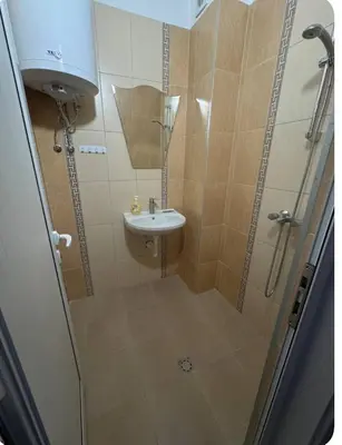 a bathroom with a shower and a sink at Anastasiya's Flat in Pomorie