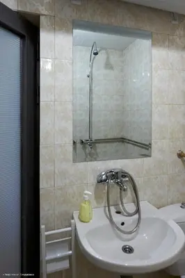 a bathroom with a sink and a shower and a mirror at Beauty 1 FREE PARKING in Burgas City