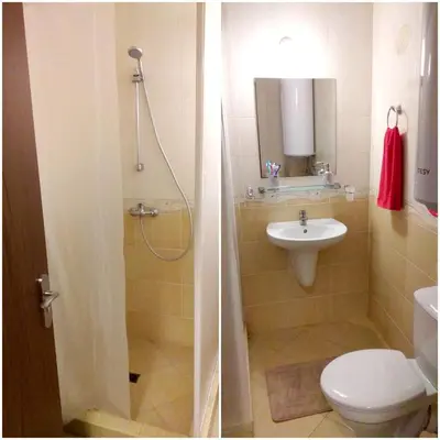 a bathroom with a toilet and a sink at Studio Alma in Byala