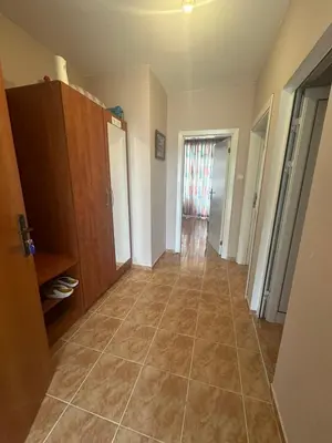 a room with a hallway with a tiled floor at Dream holiday Ravda in Ravda