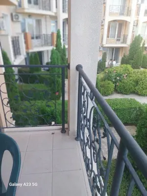 a balcony of a building with a railing at Апартамент Бяла in Byala