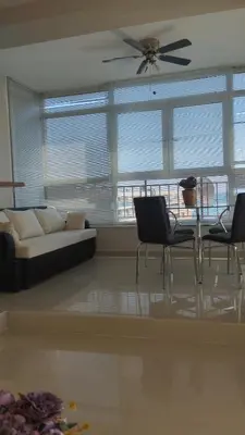 a living room with a couch and chairs and a table at Yana Privilege apartment Elinite in Elenite