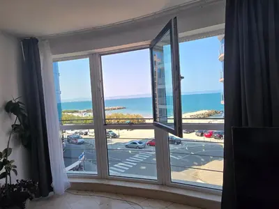 a window with a view of a parking lot at Izabela in Pomorie