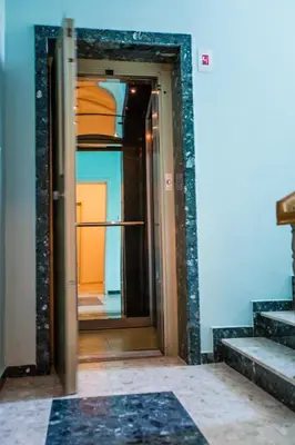 an open door to a hallway in a room at Guest House ,, Ekaterina
